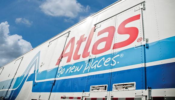 Atlas moving truck parked outside a home