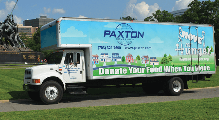 Alaska Terminal moving truck with Move for Hunger banner